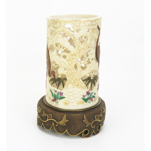 1025 - A rare Royal Worcester porcelain tusk vase in the Japanese taste, with pierced ivory ground having p... 