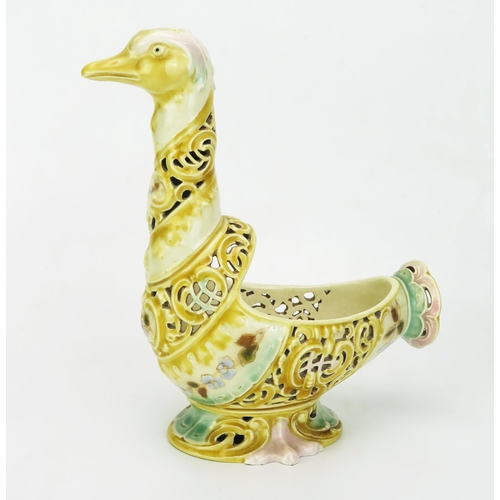 1028 - A Zsolnay Pecs pottery model of a bird, with pierced spiral decoration to the neck and body with pai... 