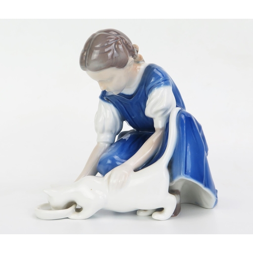 1040 - A B&G Copenhagen porcelain figure No 1745, girl feeding a cat, 14cm high.