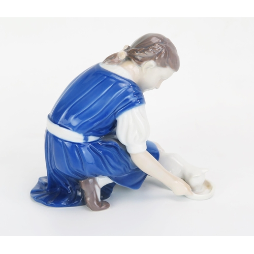 1040 - A B&G Copenhagen porcelain figure No 1745, girl feeding a cat, 14cm high.