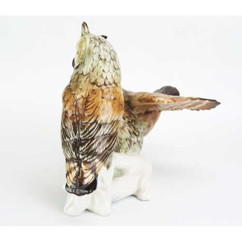 1051 - A Karl Ens Volkstedt Porcelain Group Modelled as a pair of long eared owls, 26cm tall