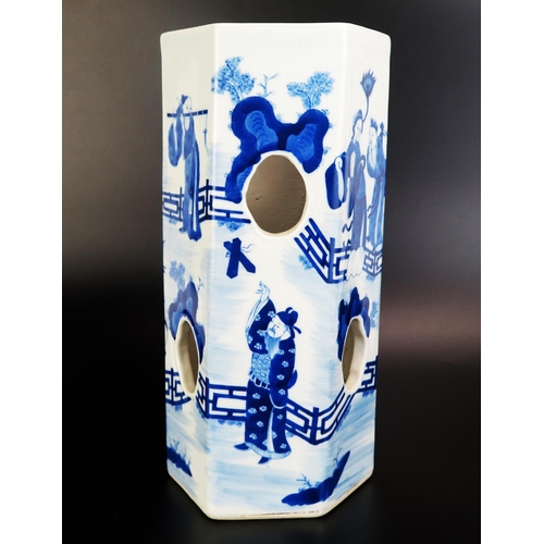 1067 - A Chinese blue and white porcelain sleeve vase of hexagonal form, with pierced sides decorated with ... 