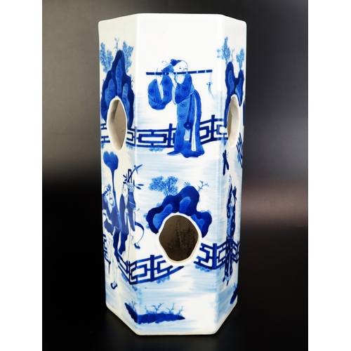 1067 - A Chinese blue and white porcelain sleeve vase of hexagonal form, with pierced sides decorated with ... 