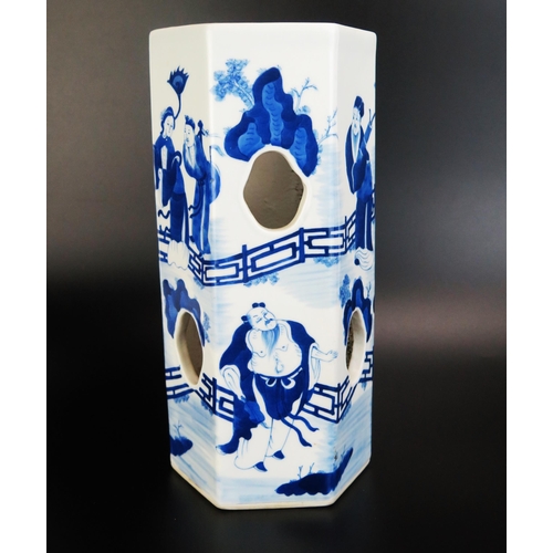 1067 - A Chinese blue and white porcelain sleeve vase of hexagonal form, with pierced sides decorated with ... 