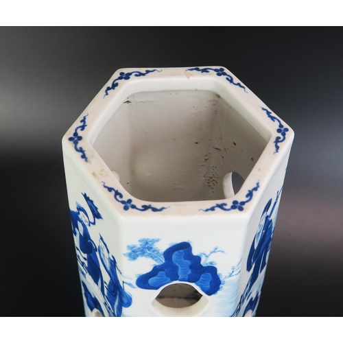 1067 - A Chinese blue and white porcelain sleeve vase of hexagonal form, with pierced sides decorated with ... 