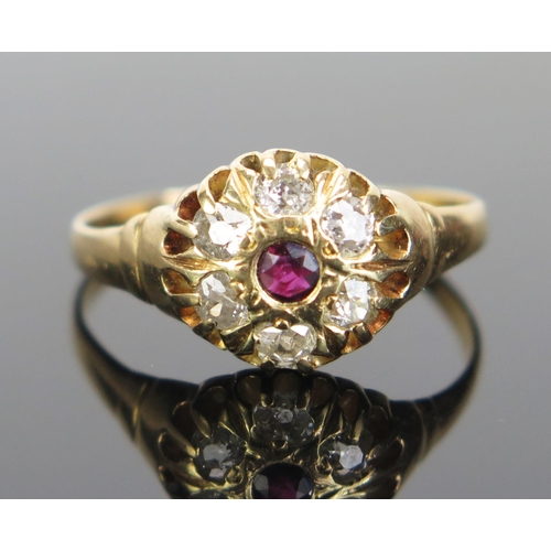 107 - An Antique 18ct Gold, Ruby and Diamond Cluster Ring, 10mm head, rubbed hallmarks, size Q.75, 3.06g. ... 