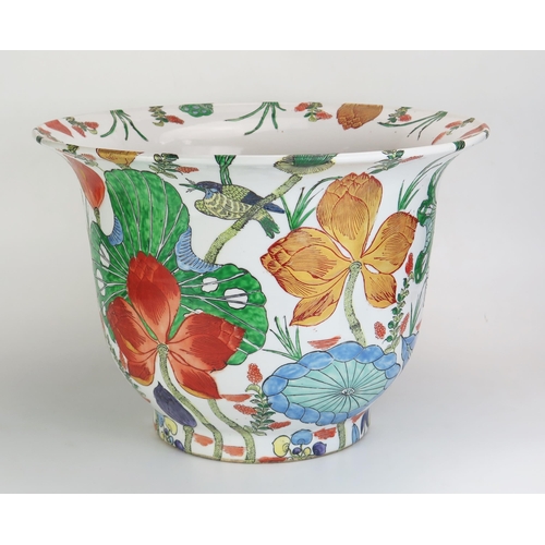 1074 - A Large Chinese porcelain jardiniere with polychrome floral decoration on a circular foot, bears six... 