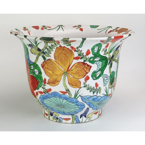 1074 - A Large Chinese porcelain jardiniere with polychrome floral decoration on a circular foot, bears six... 