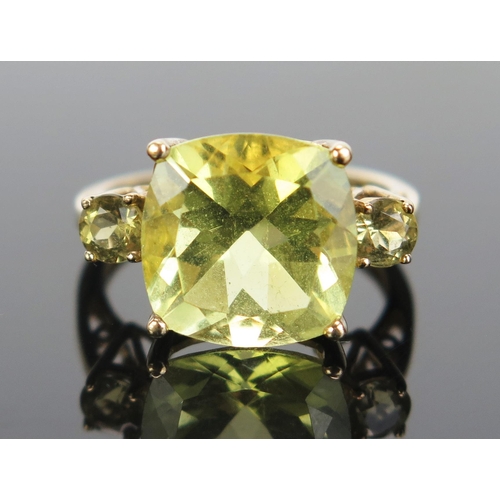 109 - A 9ct Gold and Citrine Dress Ring, 12mm central stone, hallmarked, size N, 3.68g