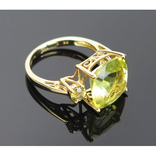 109 - A 9ct Gold and Citrine Dress Ring, 12mm central stone, hallmarked, size N, 3.68g