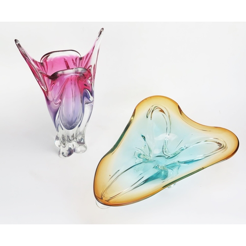 1099 - After a design by Josef Hospodke, an art glass cats head ear vase, in mauve and purple, 38cm high an... 