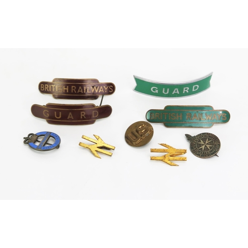 1108 - A Green enamel and brass British Rail cap badge, a similar maroon and brass badge, two guards' badge... 