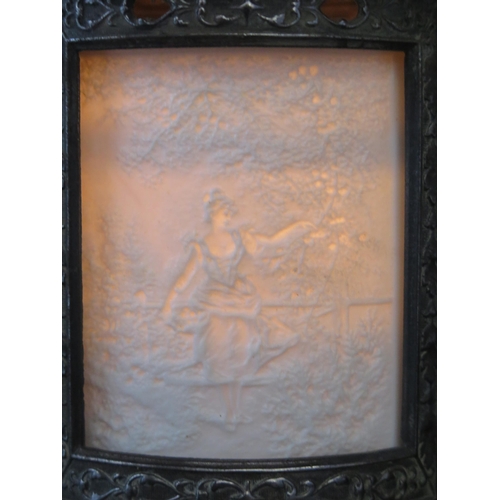 1111 - A late Victorian metal light, of cylindrical outline with lithophane panels of forest scenes, on a c... 