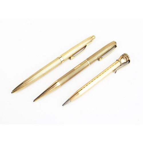 1122 - Two 9ct gold cased pens, together with a rolled gold propelling pencil, (3).