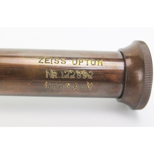 1131 - A Zeiss lacquered brass three draw telescope, commemorating the 