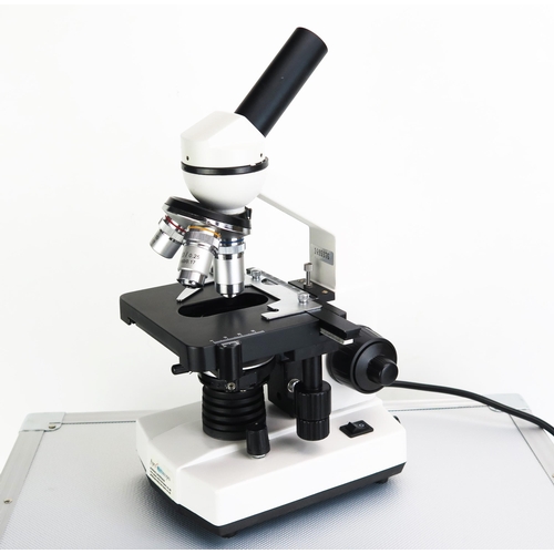 1132 - An Apex monocular microscope, with two eyepieces, course and fine focusing, rotating triple nose wit... 