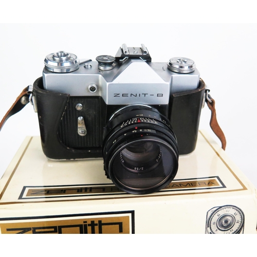 1148 - A Zenith B 35mm SLR camera, together with assorted camera accessories.