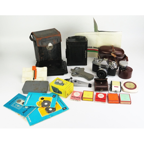 1158A - A Zeiss Ikon Contaflex 35mm camera, spare lens, filters and accessories together with an Ica Compur ... 