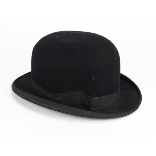 1160 - A gent's bowler hat, interior diameter 20.5