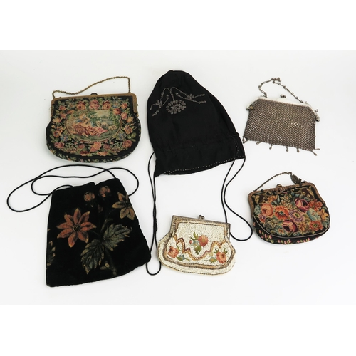 1160A - An early 20th Century chain link purse, a French beadwork purse, two machine woven purses and two po... 