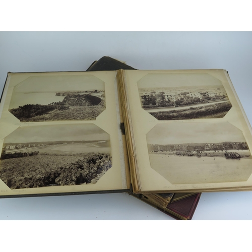 1171 - OF TORQUAY AND PAIGNTON INTEREST, a photograph album containing twelve albumen prints of the Singer ... 