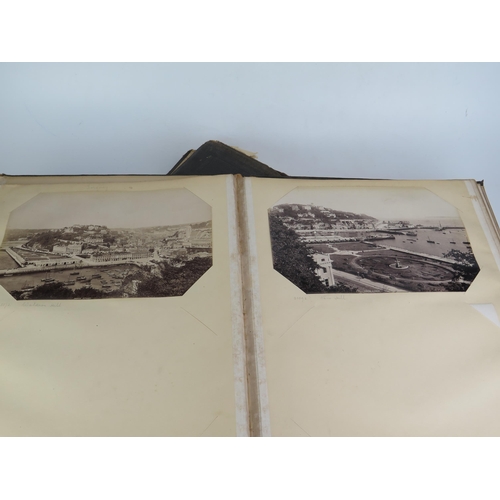 1171 - OF TORQUAY AND PAIGNTON INTEREST, a photograph album containing twelve albumen prints of the Singer ... 