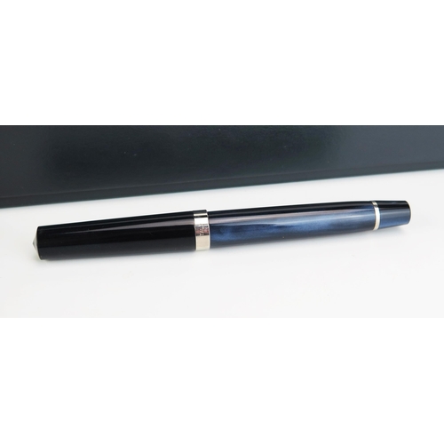 1176 - An Omas Bologna collection fountain pen, with blue/black resin body, 14k white gold nib, piston fill... 