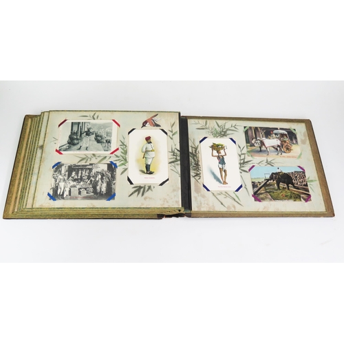 1190 - An Antique Japanese Postcard Album and contents of fifty four cards. The album with bone and MOP inl... 