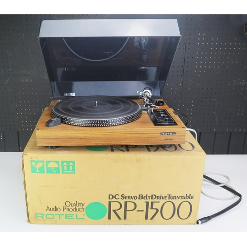 1207 - A Rotel RP-1500 turntable, contained in its original cardboard packaging.