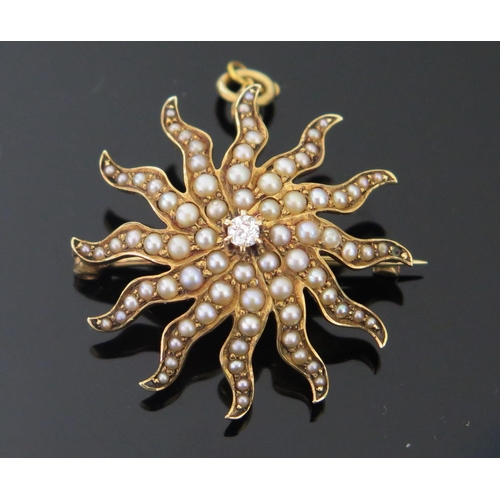 128 - A 14K untested Pearl and Cushion Cut Diamond Sunburst Brooch with articulated pendant mount, 29mm di... 