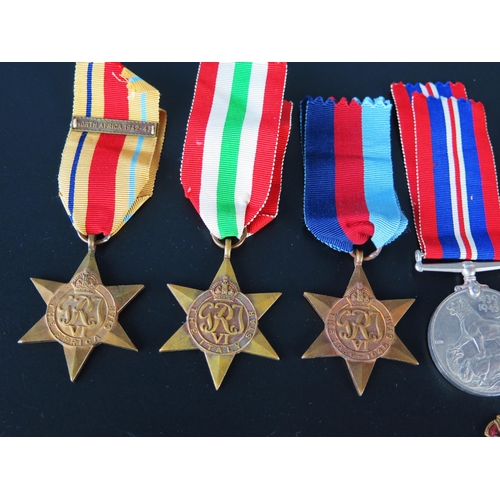 1305 - A collection of World War II medals, includes 1939-45 Star, Italy Star, Africa Star, War Medals, Def... 