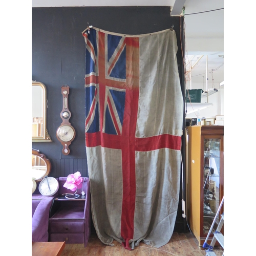 1319 - A Royal Navy White Ensign from H.M.S. Niger, by Kirk, Hall Co, Kidaore Street, Leeds, marked 