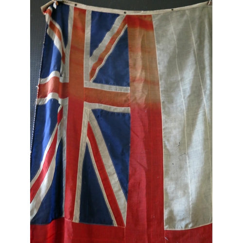 1319 - A Royal Navy White Ensign from H.M.S. Niger, by Kirk, Hall Co, Kidaore Street, Leeds, marked 