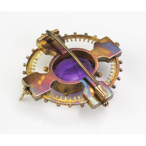 133 - An Amethyst and untested Pearl Brooch with retractable pendant mount and in a precious yellow metal ... 