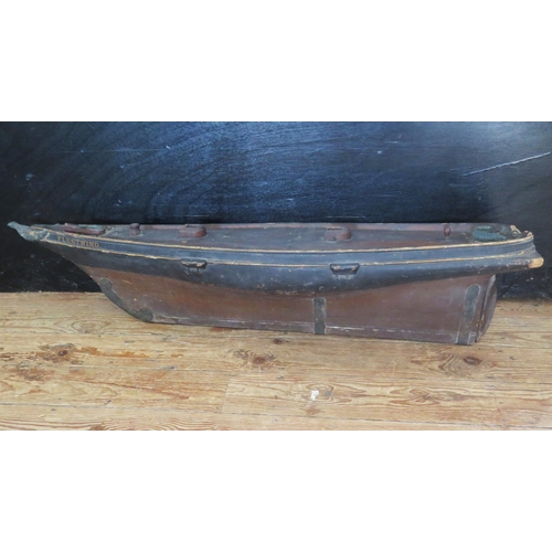 1341 - A carved solid wood model of the Schooner 