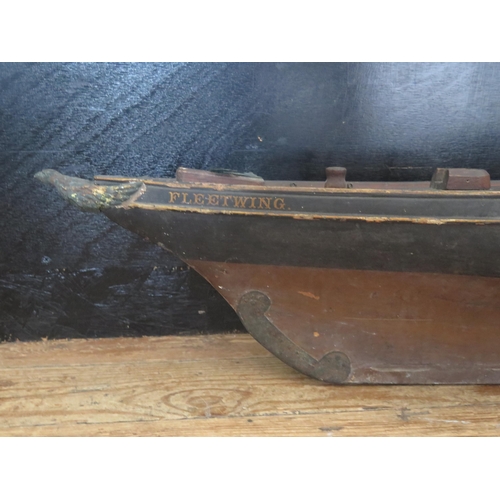 1341 - A carved solid wood model of the Schooner 