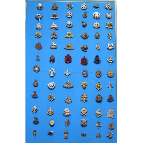 1349 - A collection of British army cap badges including Sussex, Wiltshire, Middlesex, East Surrey, Cheshir... 