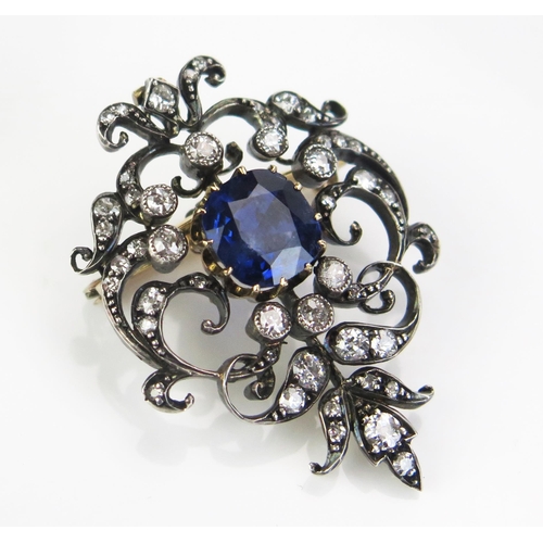 135 - An Antique Sapphire and Diamond Brooch with hinged pendant mount, the 9x8.8mm claw set deep blue sap... 