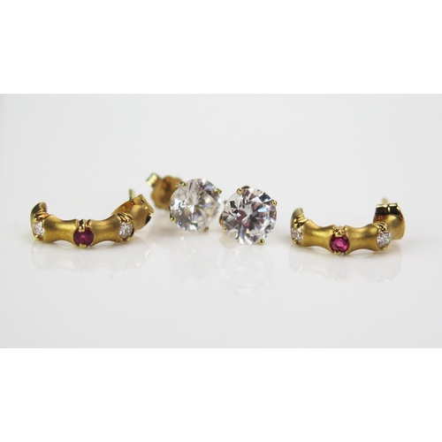 137 - A Pair of 18ct Brushed Gold, Ruby and Diamond Earrings (hallmarked, c. 13mm drop, 1.41g) and a pair ... 