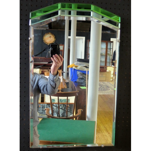 1407 - An Art Deco period frameless wall mirror, of arched outline 58 x 36cm.