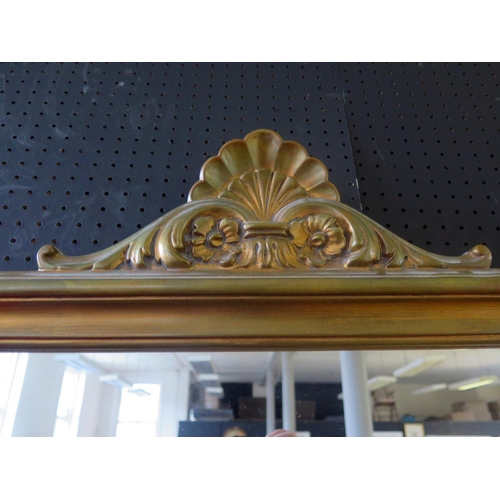 1408 - A faux giltwood Victorian style over mantel mirror of arched outline 109 x 89cm.