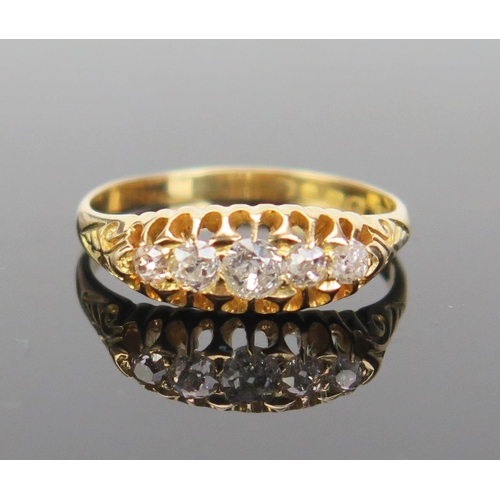 141 - An 18ct Gold and Diamond Ring, set with five 3.5x2mm cushion cut stones, hallmarked (London early 20... 