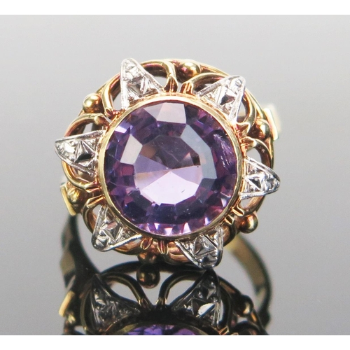 143 - A 9ct Gold and Amethyst Dress Ring, 11mm stone, 19mm head, marked 9CT, size Q.5, 6g