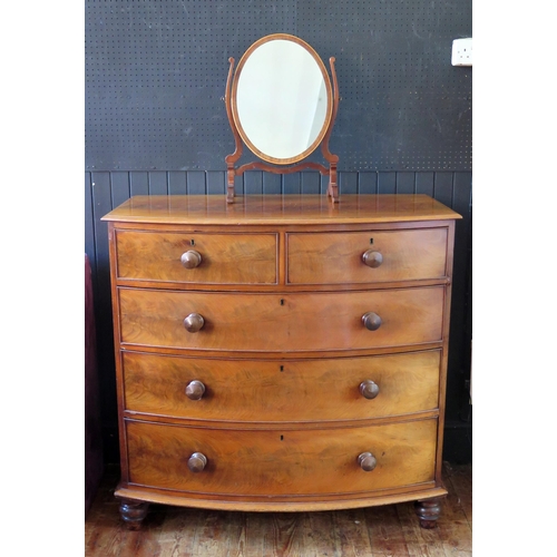 1438 - A Victorian Mahogany Bow Fronted Chest of Drawers, 109(w)x108(h)x59(d)cm and a swivel toilet mirror