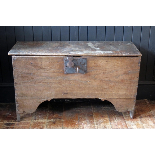 1440 - A Seventeenth Century Oak Coffer of six plank construction with candle box and later lock with key, ... 