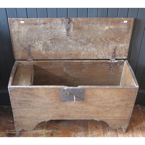 1440 - A Seventeenth Century Oak Coffer of six plank construction with candle box and later lock with key, ... 