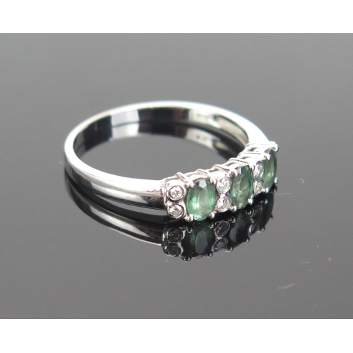 145 - A 10K White Gold, Gem Set and Diamond Dress Ring, 16x10mm head, stamped 10K and 375 continental mark... 