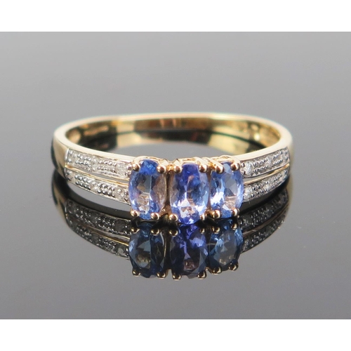 147 - A 14K Gold, Tanzanite and Diamond Ring, various marks, size R.5, 1.93g