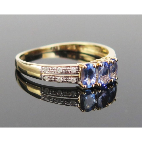 147 - A 14K Gold, Tanzanite and Diamond Ring, various marks, size R.5, 1.93g