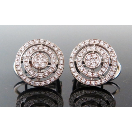 149 - A Pair of Diamond Target Earrings set in precious white metal (probably platinum), 19.5mm heads, 8.2... 